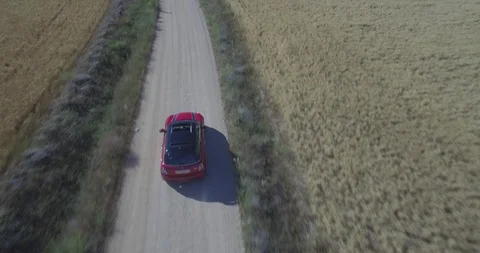 Drone aerial view of Mini Cooper car while driving Stock Footage 106115422