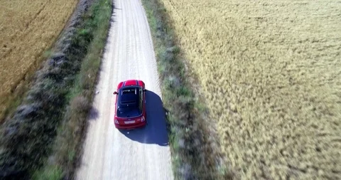 Drone aerial view of Mini Cooper car while driving Stock Footage 106115595