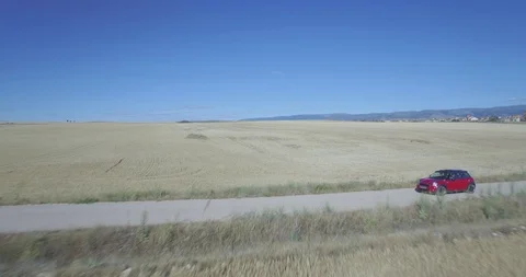 Drone aerial view of Mini Cooper car while driving Stock Footage 106117906