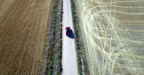 Drone aerial view of Mini Cooper car while driving Stock Footage 106120315