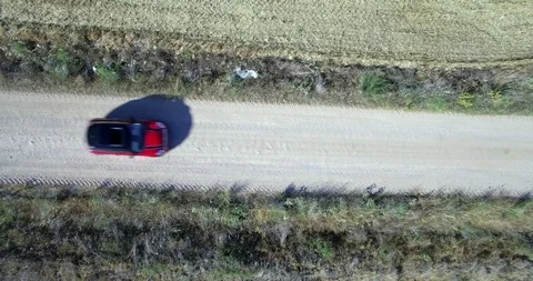 Drone aerial view of Mini Cooper car while driving Stock Footage 106120441