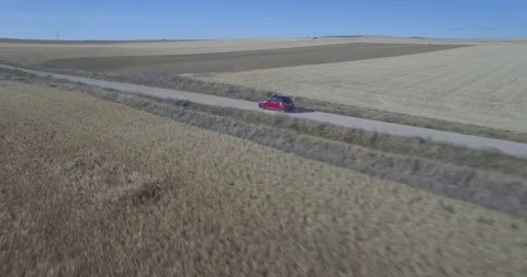 Drone aerial view of Mini Cooper car while driving Stock Footage 106121305
