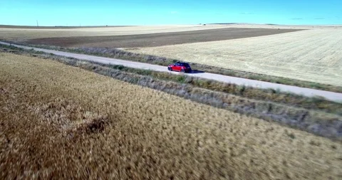 Drone aerial view of Mini Cooper car while driving Stock Footage 106121596