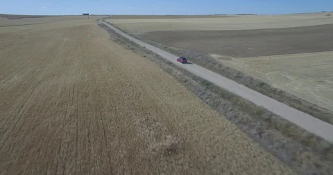 Drone aerial view of Mini Cooper car while driving Stock Footage 106179511