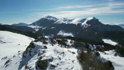 Drone Aerial View of Monte Altissimo – Snowy Alpine Landscape, Rocky Ridges and Vídeo Stock 331223257