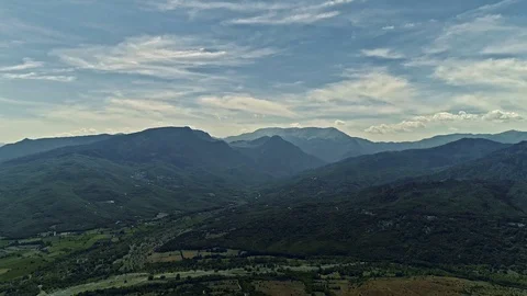 Drone, aerial view of mountain range in Greece with cumulus, stratus and cirrus Video stock 122513834