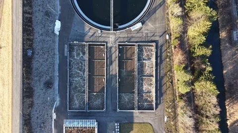 Drone Aerial View of  multiple wastewater treatment basins 스톡 동영상 329014085