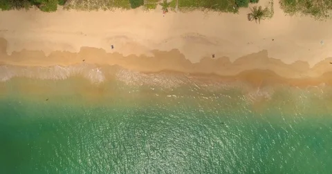 Drone aerial view of ocean waves reaching shore. Aerial view of the tropical Video stock 75650780