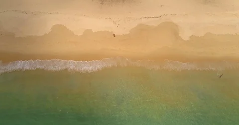 Drone aerial view of ocean waves reaching shore. Aerial view of the tropical Video stock 75651042