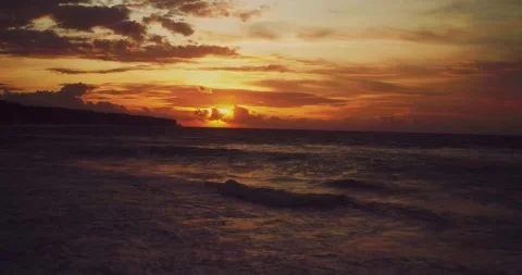 Drone Aerial View of Ocean Waves During Tropical Sunset Stock Footage 331276914