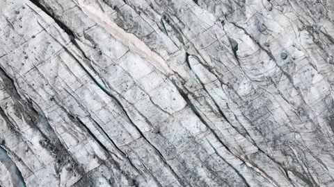 Drone aerial view over Bessanese rocky mountain glacier with crevasses Stock Footage 292811141