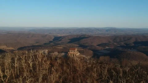Drone Aerial View Over Cabin Lookout Tower Forest Landscape Stock Footage 255751156