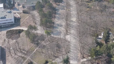 Drone Aerial View Of Park Pathways Trees And Urban Landscape Stock Footage 330131652