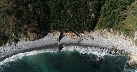 Drone aerial view of pebble beach of Taejongdae scenic spot in Busan Stock Footage 100968141