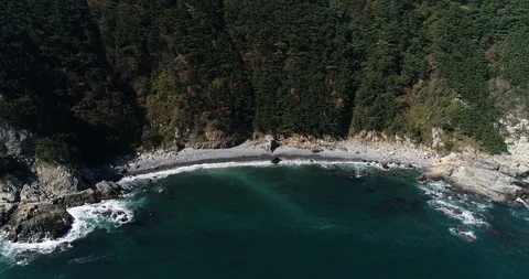 Drone aerial view of pebble beach of Taejongdae scenic spot in Busan Stock Footage 100968142
