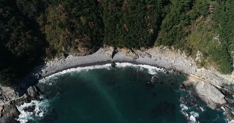 Drone aerial view of pebble beach of Taejongdae scenic spot in Busan Stock Footage 100968158
