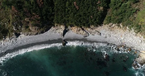 Drone aerial view of pebble beach of Taejongdae scenic spot in Busan Stock Footage 100968165