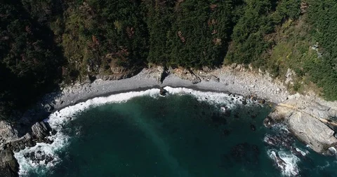 Drone aerial view of pebble beach of Taejongdae scenic spot in Busan Stock Footage 100968179