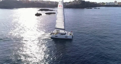 Drone Aerial View Of people Sailing A Catamaran Boat At Mediterranean sea Stock Footage