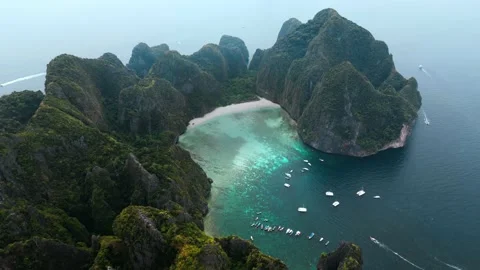 Drone aerial view at Phi Phi Island Maya Bay Thailand. Aerial shot of beautiful Stock Footage 238536487