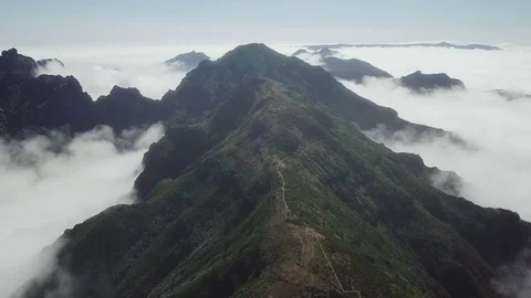 Drone aerial view of "Pico Ruivo" footpath on a sunset in Madeira island Stock Footage 120074553