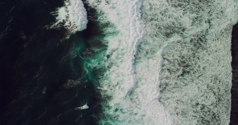 Drone Aerial View of Powerful Waves Breaking Over Coastal Rocks 스톡 동영상 330589615