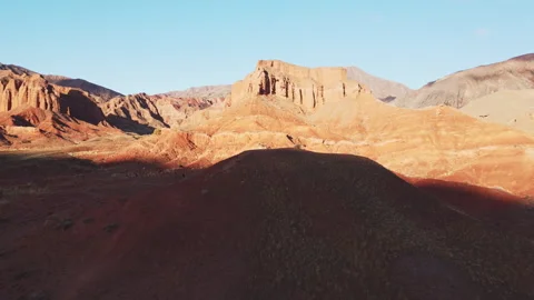 Drone aerial view of red rock formations in Konorchek Canyons, Kyrgyzstan, at Видео 335028086