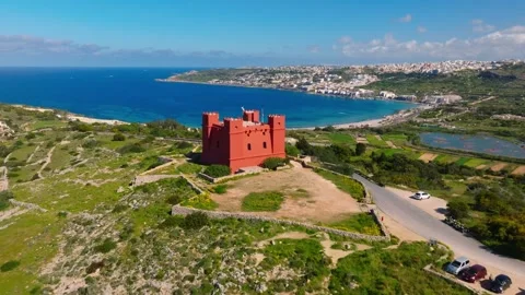 Drone aerial view of Red tower on Maltese island Stock Footage 305883377