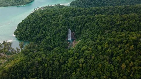 Drone Aerial View of Remote Tropical Waterfall in Karawawi Kaimana West Papua In Stock Footage 334839840