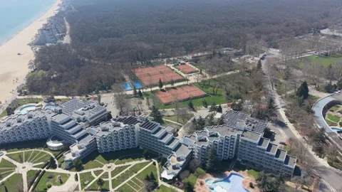 Drone aerial view of resort complex with beach and pools Stock-Footage 332247410