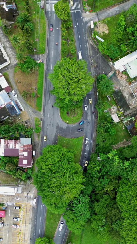 Drone Aerial View of Road U-Turn with Traffic Flow, Urban Infrastructure Stock Footage 308052045