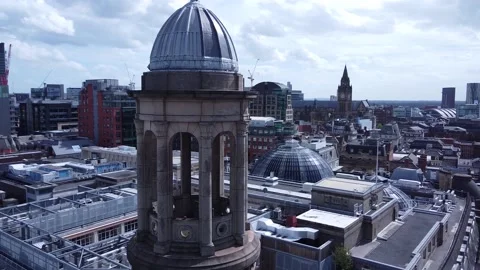 Drone Aerial view of the Royal Exchange Theatre Bell Tower Manchester UK Stock Footage