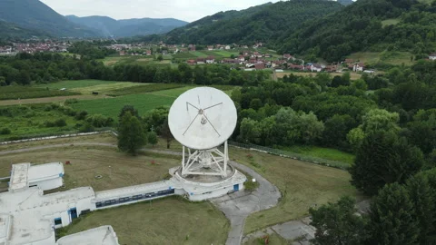 Drone Aerial View of Satellite Ground Station With Big Parabolic Antenna Stock Footage 156947551