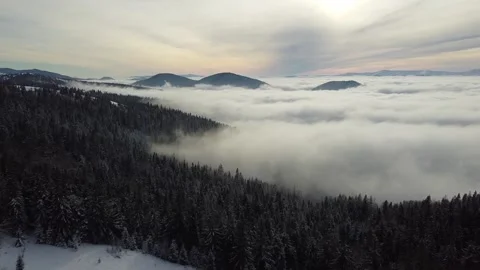 Drone Aerial View of Sea of Clouds Over Mountain Landscape Stock Footage 323944618