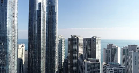 Drone aerial view of skyscraper and high rise in Haeundae, Busan Stock Footage 100960260
