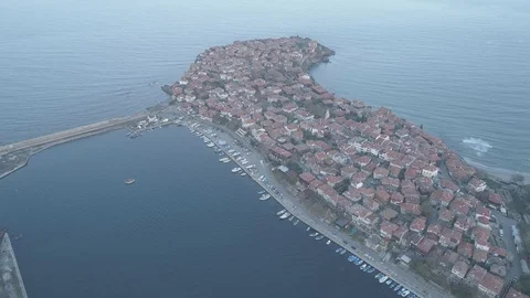 Drone aerial view of sunset on the Sozopol Old town 4k Stockbeeldmateriaal 100128488