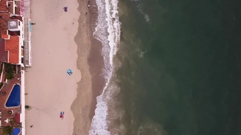 Drone aerial view top down of relaxing view of green ocean waves crashing Stock Footage 221234668