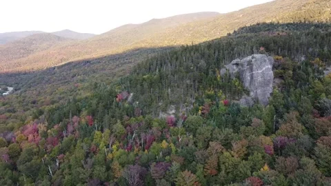 Drone aerial view of trees on Mount Washington and surrounding mountain range Stock Footage 139723080