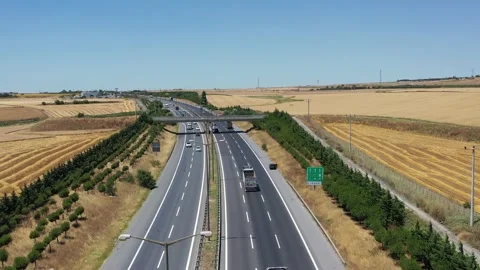 Drone aerial view of vehicles in motion on the highway Stock Footage 150055527