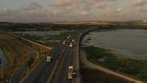 Drone aerial view of vehicles in motion on the highway Stock Footage 150055708