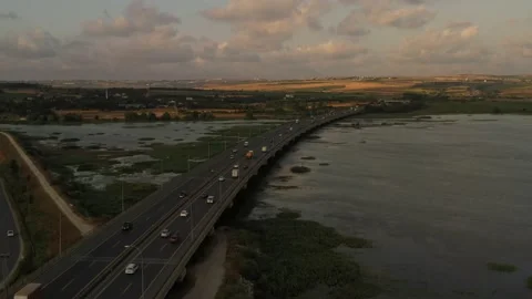 Drone aerial view of vehicles in motion on the highway Stock Footage 150056149