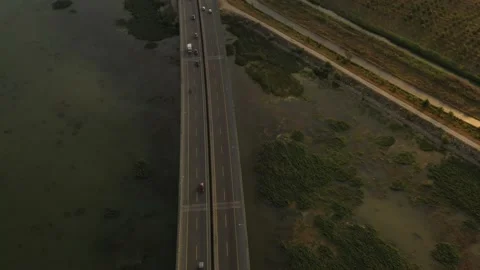 Drone aerial view of vehicles in motion on the highway Stock Footage 150057247