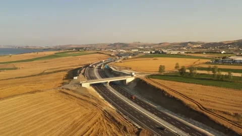 Drone aerial view of vehicles in motion on the highway Stock Footage 150057671