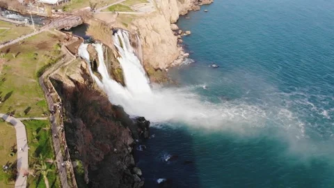 Drone Aerial View Of The Waterfall And The Park On The High Sea Shore Stock Footage 195098544