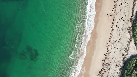Drone aerial view of waves hitting sandy beach in Normandy, France Vídeo Stock 333205767