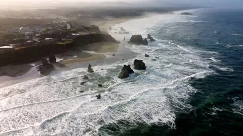 Drone aerial view of waves splashing on the beach Stock Footage 229341270