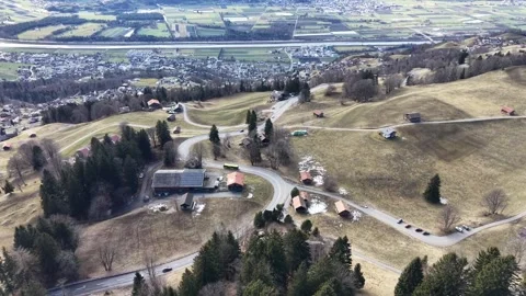 Drone aerial view of winding mountain roads with flowing traffic 스톡 동영상 329505697