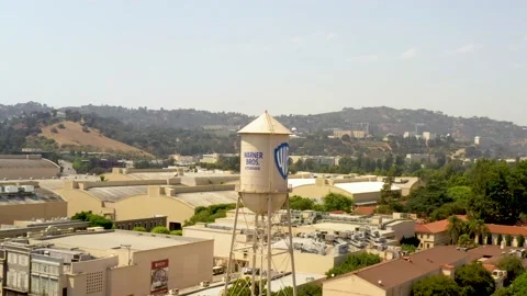 Drone aerial of the Warner Bros. Studio lot water tower in Burbank, CA Stock-Footage 137754105