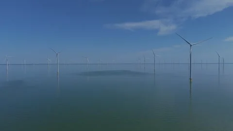 Drone aerial of wind farm over open water Stock Footage 343839684