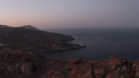 Drone Aerials of Patmos' Rugged Cliffs: A Visual Journey Through Time Stock Footage 234147269